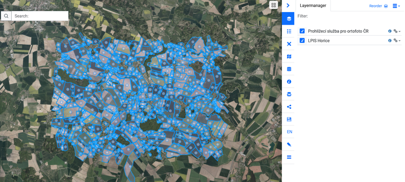 And HSLayers-based WebGIS application with two layers. One from a WMS server and the other from a connected data catalogue.